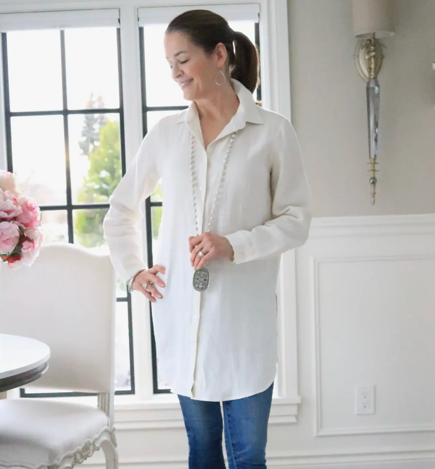 The Christina tunic is 100% European linen button front blouse made longer with slits on the side so it can be worn over leggings, skinny jeans, or as a light jacket. Very comfortable for a casual look or dress it up. Runs true to size.