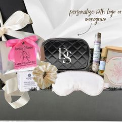 Customized gift box for her featuring silk pillowcase, eye mask, and skincare products, perfect for personalization.