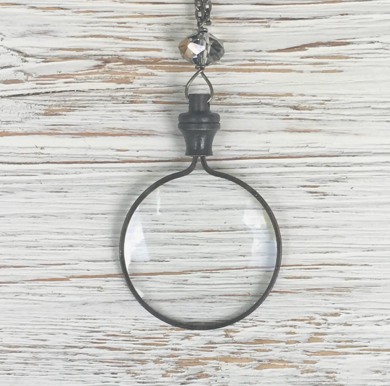 Magnifying glass pendant necklace