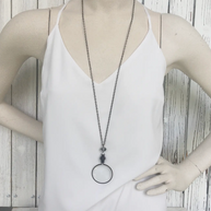 Magnifying glass pendant necklace