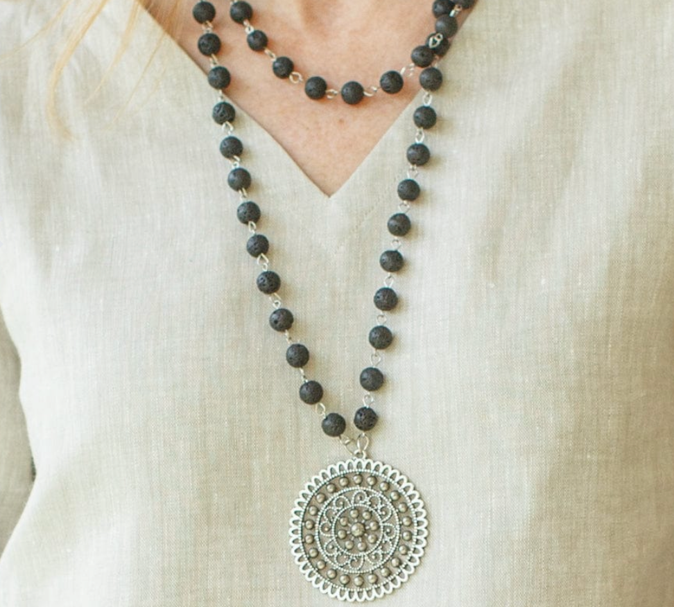 This timeless piece features a long pendant fashioned from beautiful black stone for an elegant touch. Wear it to dress up any look - it pairs flawlessly with jeans or one of our dresses.