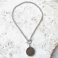 Silver necklace with coin medallion